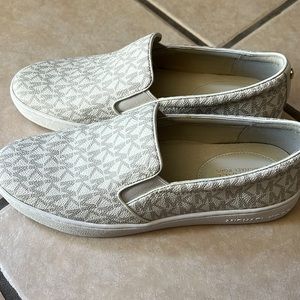 Brand new MK slip on sneakers